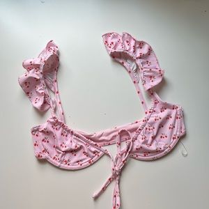 Baby pink strawberry bikini top size XS.